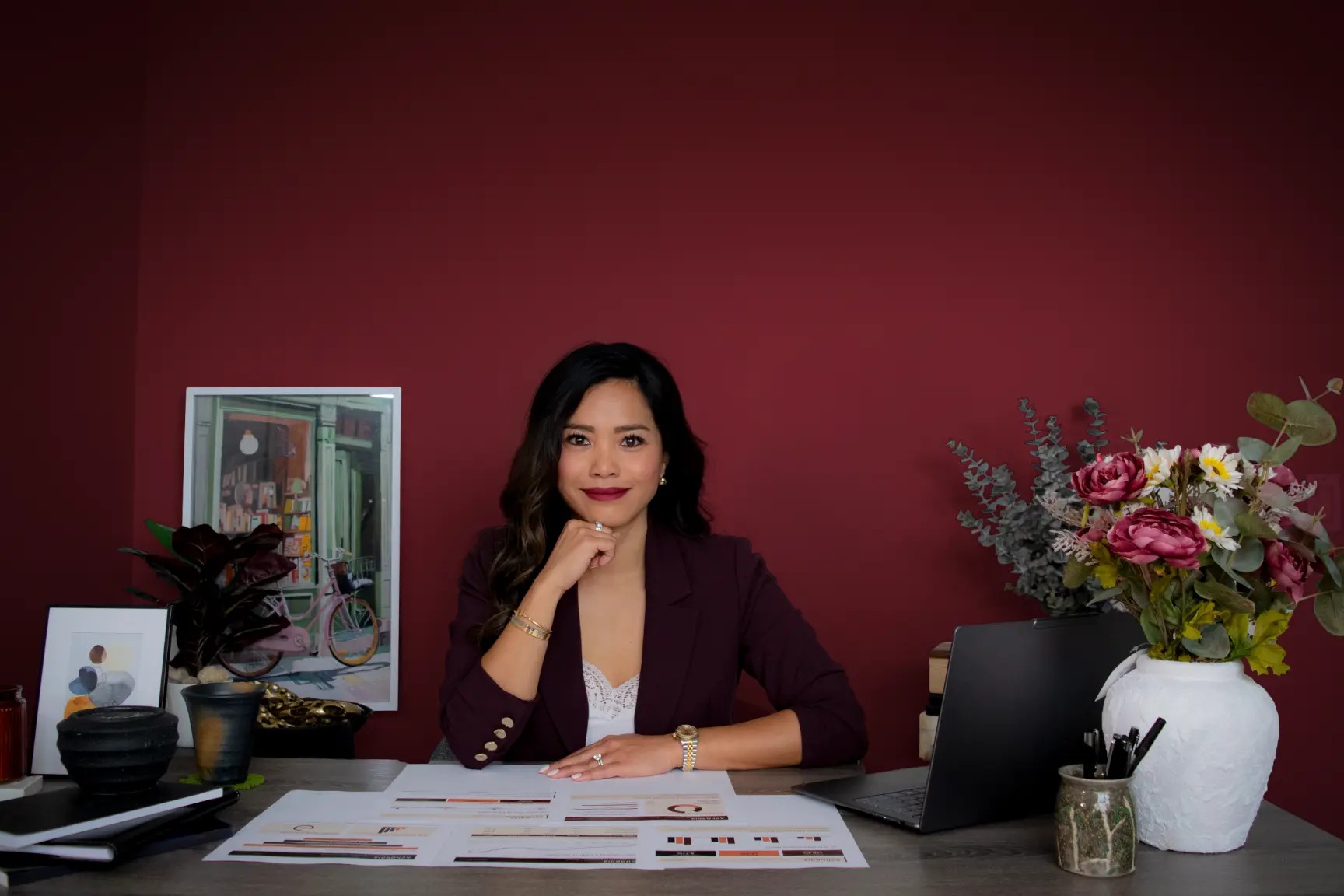 Campaign planning and brand materials on a consultant's desk